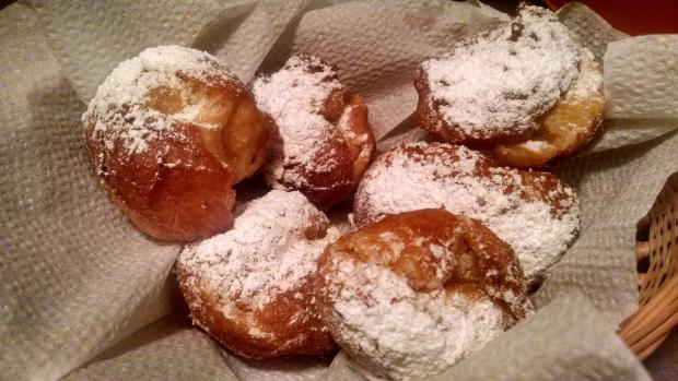 removed from oil and dusted with powdered sugar
